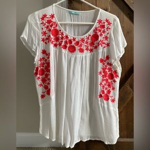 White Maurice’s top with red flowers